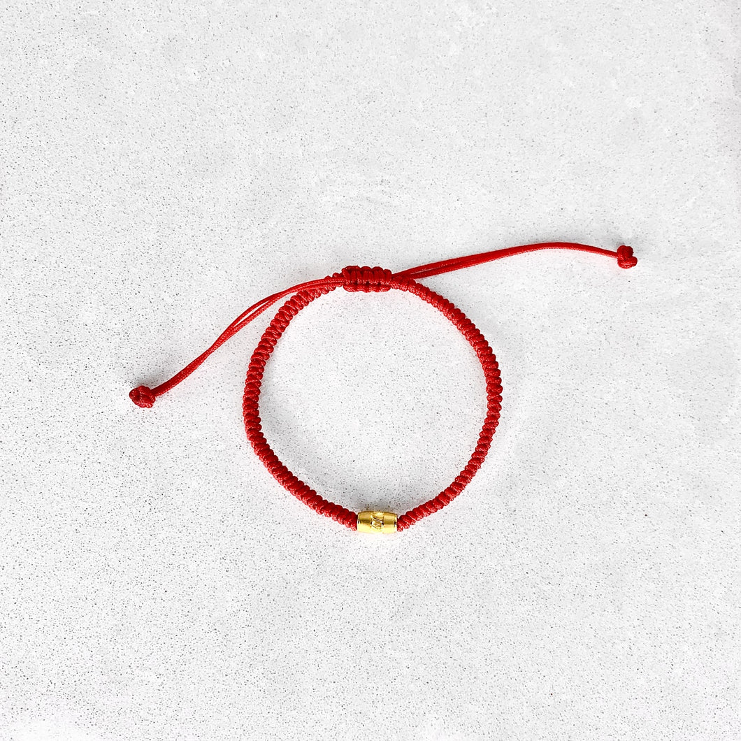 Red Bracelet with Gold Bead